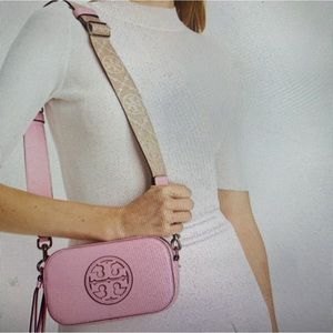 New/only used twice. Great bag beautiful color! Current Style on website.